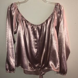 Off the shoulder pink top.